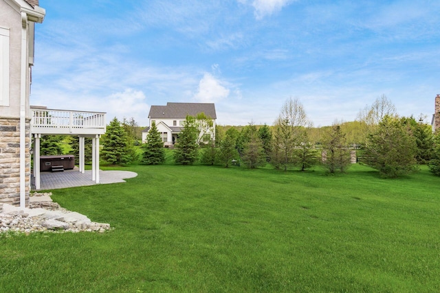 1393 Kearney Way, Delaware, OH 43015 - view of grassy yard with a hot tub and a patio area