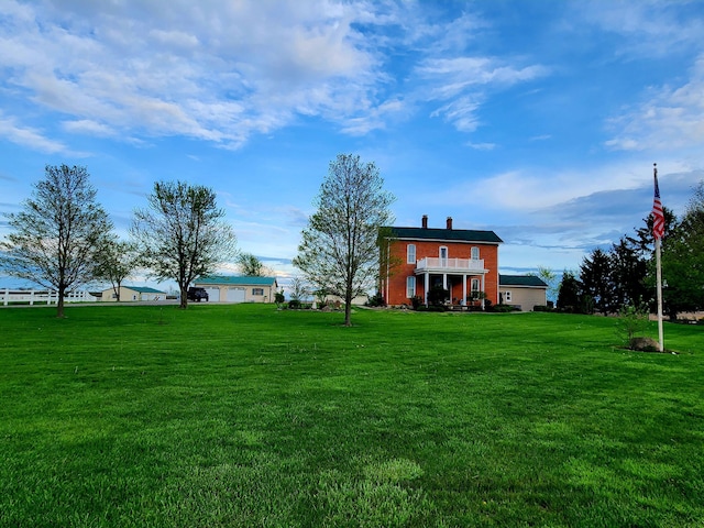 exterior space with a lawn and brick siding