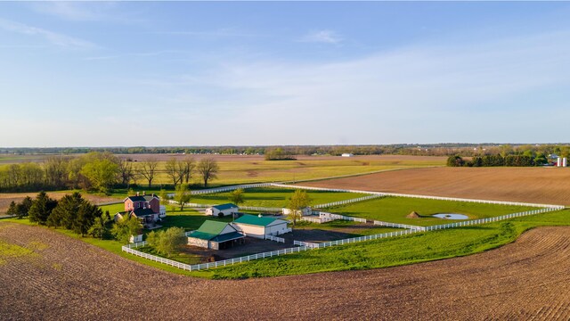 birds eye view of property featuring a rural view
