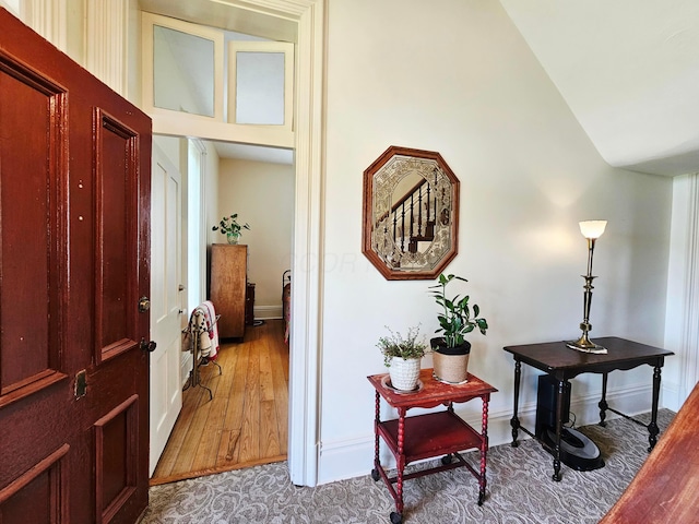 3851 Snow Hill Rd SW, Washington Court House, OH 43160 - corridor featuring wood finished floors, high vaulted ceiling, and baseboards