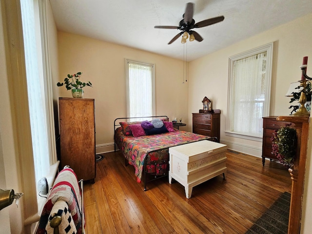 3851 Snow Hill Rd SW, Washington Court House, OH 43160 - bedroom featuring wood-type flooring, baseboards, and a ceiling fan