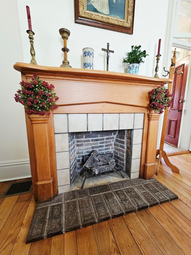 3851 Snow Hill Rd SW, Washington Court House, OH 43160 - detailed view of a fireplace and wood finished floors