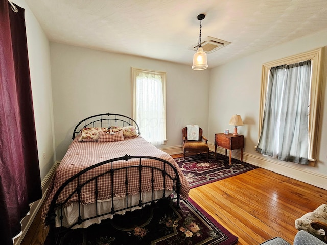 3851 Snow Hill Rd SW, Washington Court House, OH 43160 - bedroom with hardwood / wood-style flooring and baseboards