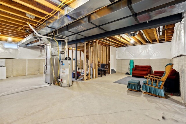 unfinished below grade area featuring gas water heater