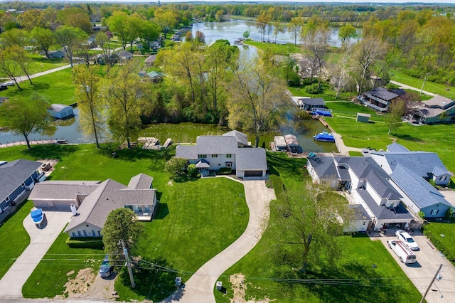 bird's eye view with a water view and a residential view