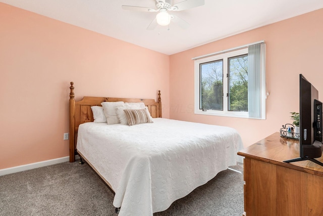 bedroom featuring carpet floors, baseboards, and ceiling fan