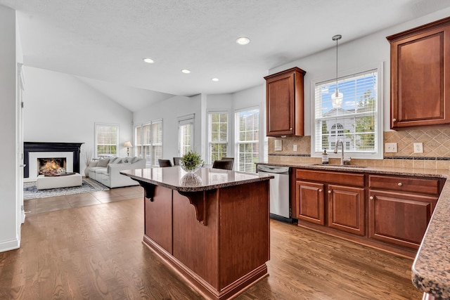 7169 Fernridge Dr, New Albany, OH 43054 - kitchen with a sink, dishwasher, decorative backsplash, stone countertops, and recessed lighting