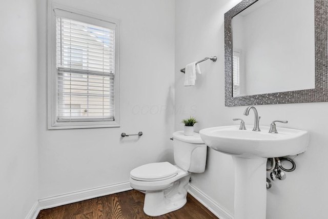 7169 Fernridge Dr, New Albany, OH 43054 - bathroom with baseboards, wood finished floors, and toilet