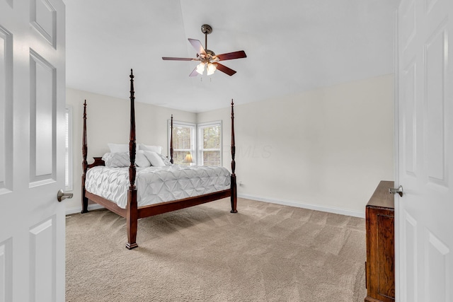 7169 Fernridge Dr, New Albany, OH 43054 - bedroom with light carpet, baseboards, and ceiling fan