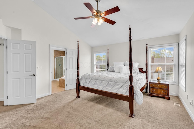 7169 Fernridge Dr, New Albany, OH 43054 - bedroom with light colored carpet, baseboards, connected bathroom, ceiling fan, and high vaulted ceiling