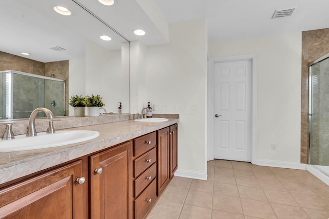 7169 Fernridge Dr, New Albany, OH 43054 - bathroom with tile patterned floors, a stall shower, double vanity, and baseboards