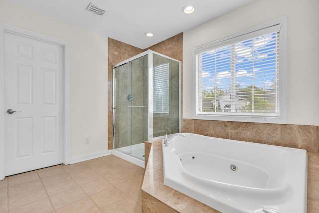 7169 Fernridge Dr, New Albany, OH 43054 - full bathroom with a shower stall, a tub with jets, tile patterned flooring, and recessed lighting