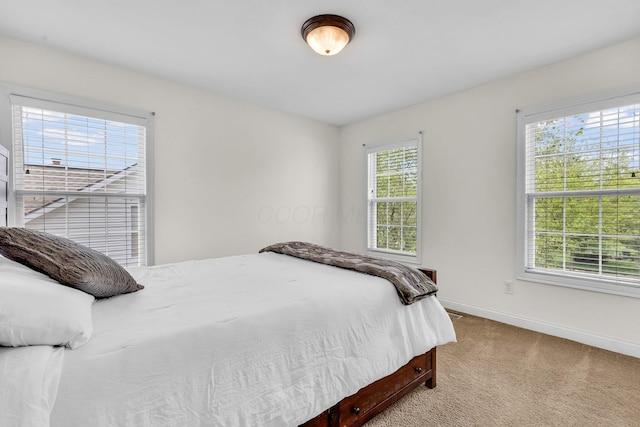 7169 Fernridge Dr, New Albany, OH 43054 - bedroom featuring carpet flooring and baseboards