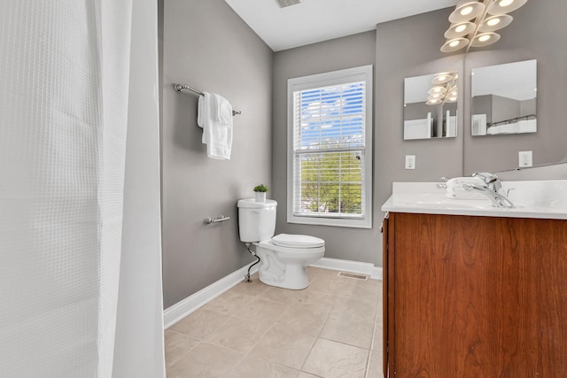 7169 Fernridge Dr, New Albany, OH 43054 - bathroom with baseboards, toilet, vanity, and tile patterned flooring