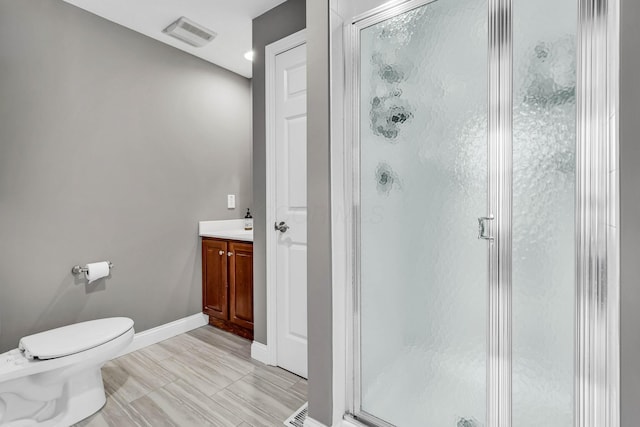 7169 Fernridge Dr, New Albany, OH 43054 - full bathroom with a stall shower, baseboards, and toilet