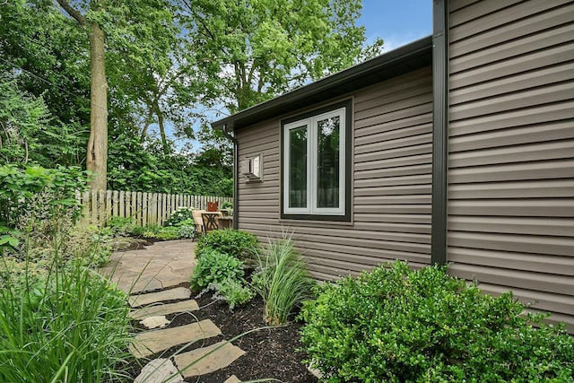1799 Baldridge Rd, Columbus, OH 43221 - view of side of home featuring fence and a patio