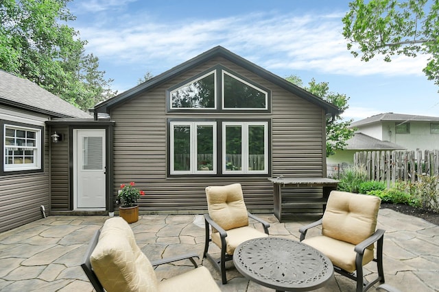 1799 Baldridge Rd, Columbus, OH 43221 - rear view of house featuring a patio and fence