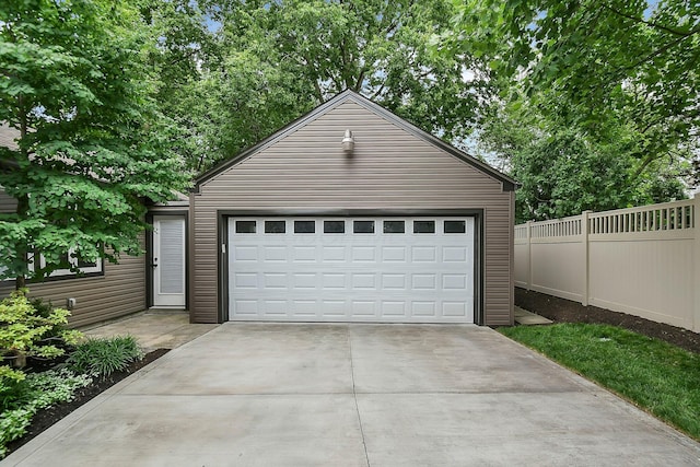 1799 Baldridge Rd, Columbus, OH 43221 - garage with fence and concrete driveway