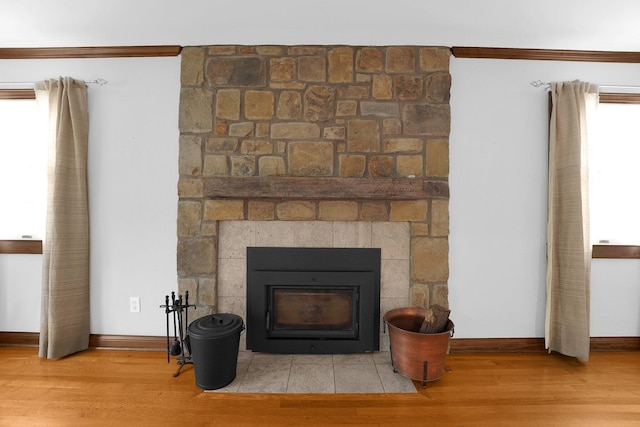 1799 Baldridge Rd, Columbus, OH 43221 - detailed view of wood finished floors, a fireplace, crown molding, and baseboards