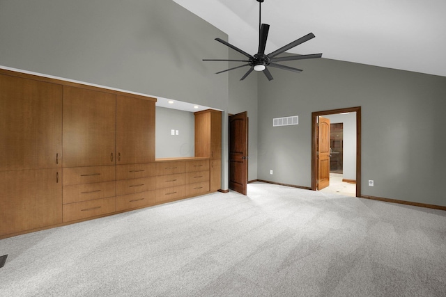 1799 Baldridge Rd, Columbus, OH 43221 - unfurnished bedroom with high vaulted ceiling, light colored carpet, baseboards, ensuite bathroom, and a ceiling fan