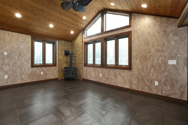 1799 Baldridge Rd, Columbus, OH 43221 - unfurnished living room featuring a wood stove, plenty of natural light, ceiling fan, recessed lighting, and wood ceiling