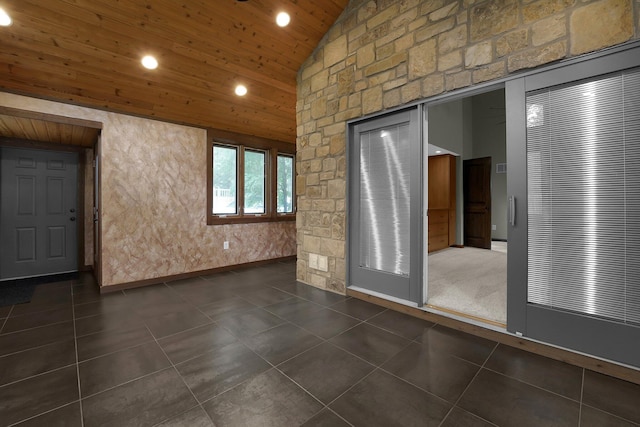 1799 Baldridge Rd, Columbus, OH 43221 - empty room featuring wooden ceiling, recessed lighting, dark tile patterned floors, and high vaulted ceiling