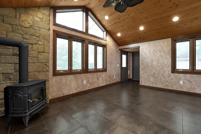 1799 Baldridge Rd, Columbus, OH 43221 - unfurnished living room with a wood stove, wooden ceiling, recessed lighting, a ceiling fan, and baseboards