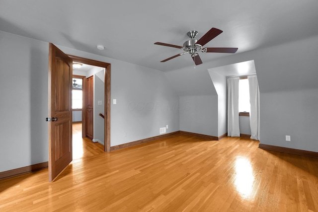 1799 Baldridge Rd, Columbus, OH 43221 - additional living space featuring light wood-style flooring, ceiling fan, baseboards, and lofted ceiling