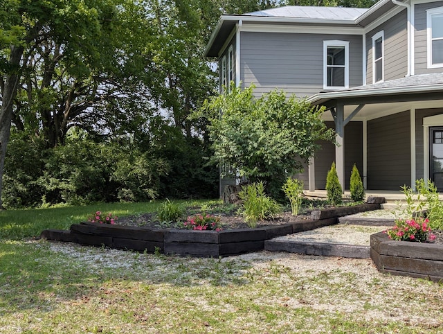 2310 Troy Rd, Delaware, OH 43015 - view of green lawn featuring covered porch