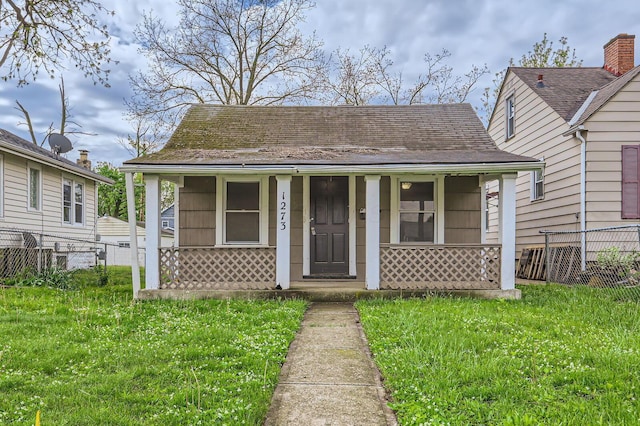 1273 Minnesota Ave, Columbus, OH 43211 - bungalow with covered porch and roof with shingles
