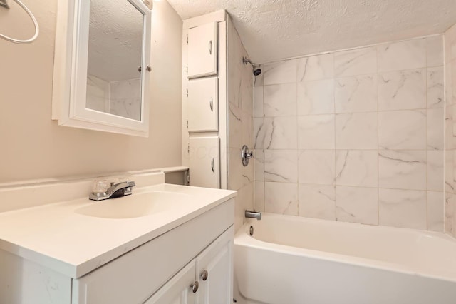 1273 Minnesota Ave, Columbus, OH 43211 - bathroom with a textured ceiling, tub / shower combination, and vanity