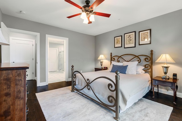 bedroom featuring ceiling fan, baseboards, and wood finished floors
