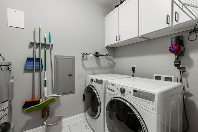 laundry area featuring baseboards, marble finish floor, electric panel, washer and clothes dryer, and cabinet space