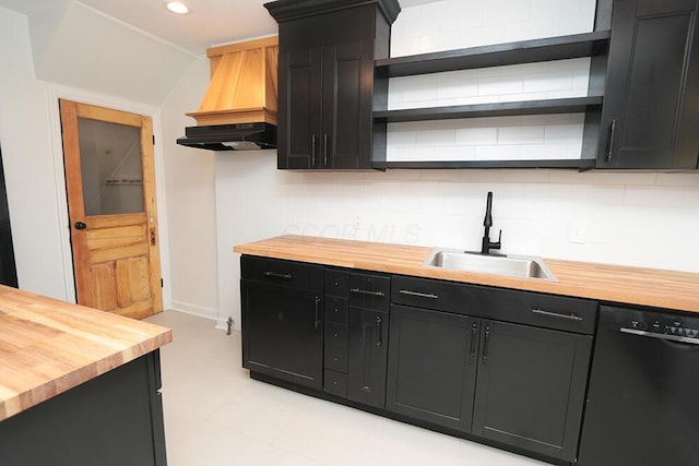 kitchen with open shelves, a sink, dark cabinetry, wooden counters, and black dishwasher
