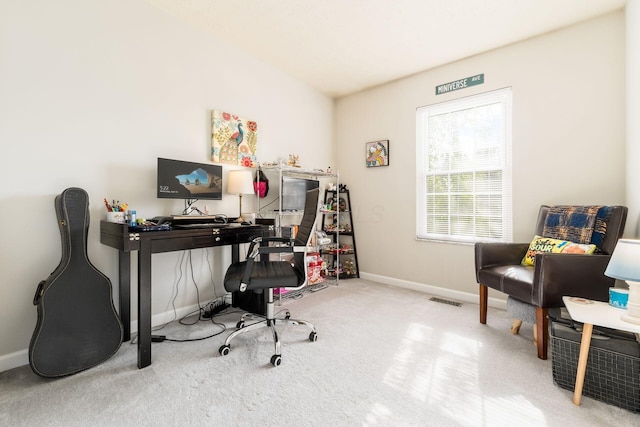 office with carpet floors, baseboards, and visible vents