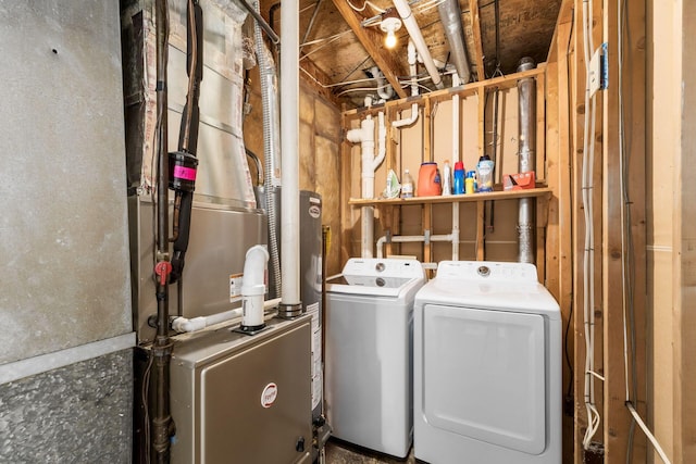 laundry room featuring laundry area and washer and clothes dryer