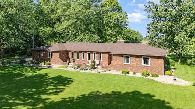 333 Salem Rd, Caledonia, OH 43314 - single story home with a front yard, brick siding, a chimney, and roof with shingles