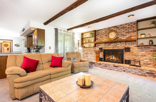 333 Salem Rd, Caledonia, OH 43314 - carpeted living room with beam ceiling, a brick fireplace, and a sink