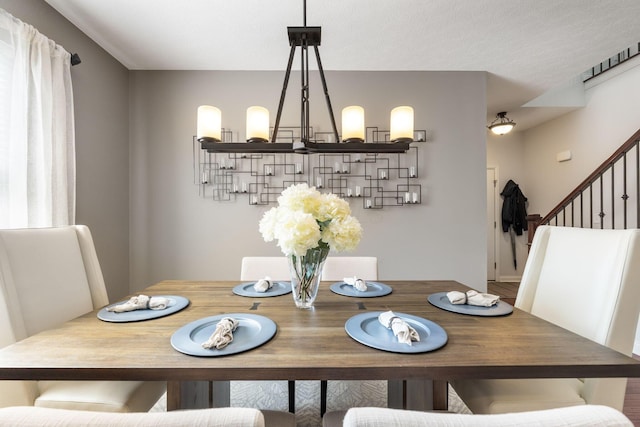 dining room with stairs