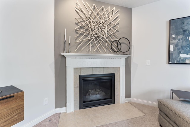 interior details with baseboards and a fireplace