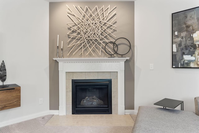 details featuring carpet, baseboards, and a fireplace