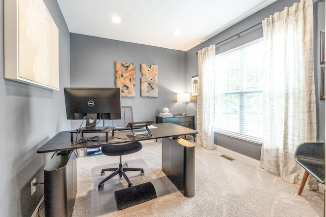 office space with carpet floors, recessed lighting, baseboards, and visible vents