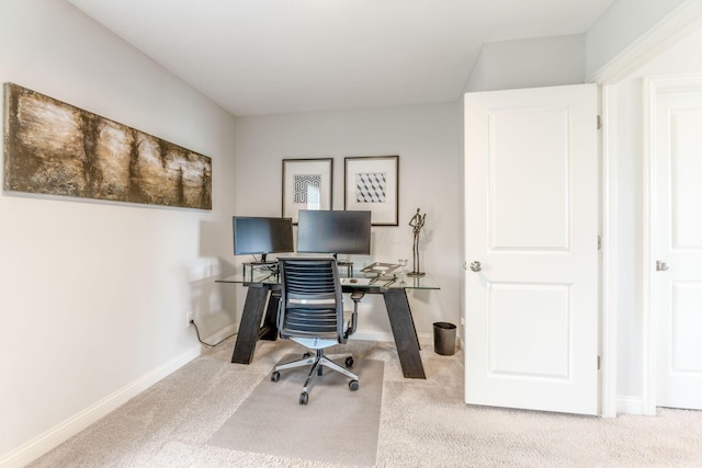 office area featuring carpet floors and baseboards