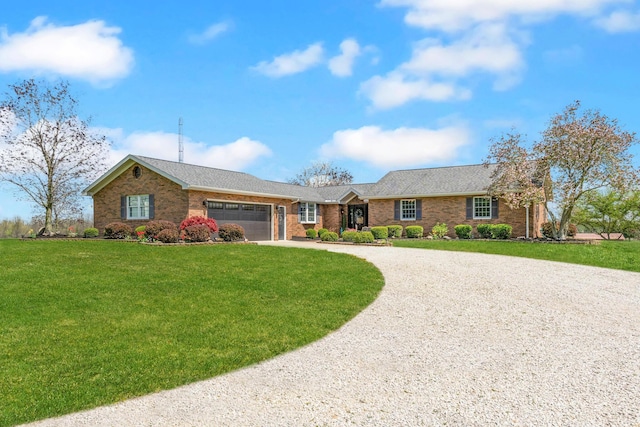 1012 Lake Fork Rd, Utica, OH 43080 - ranch-style home with a shingled roof, a front lawn, brick siding, a garage, and gravel driveway