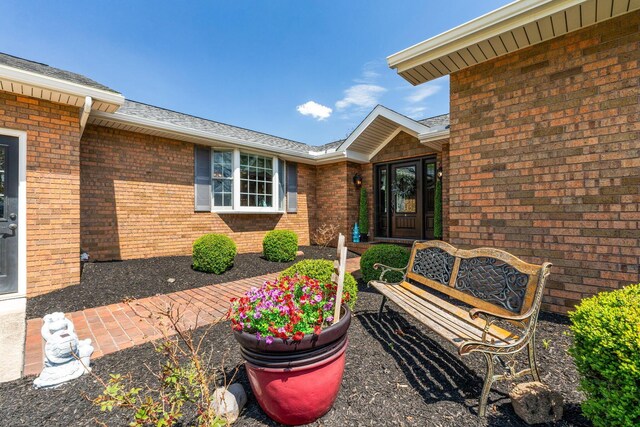 1012 Lake Fork Rd, Utica, OH 43080 - property entrance featuring brick siding and a shingled roof