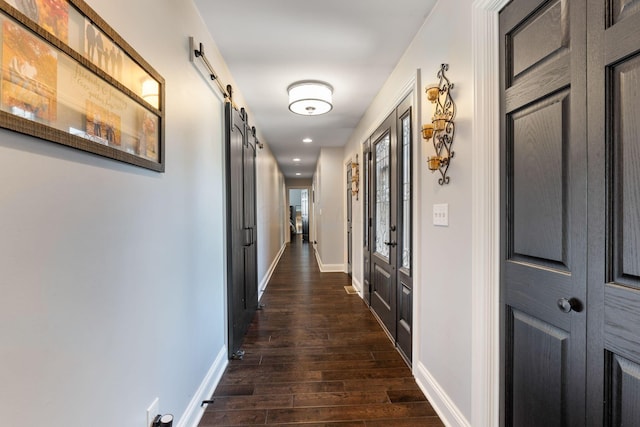1012 Lake Fork Rd, Utica, OH 43080 - hallway with recessed lighting, a barn door, dark wood-style floors, and baseboards
