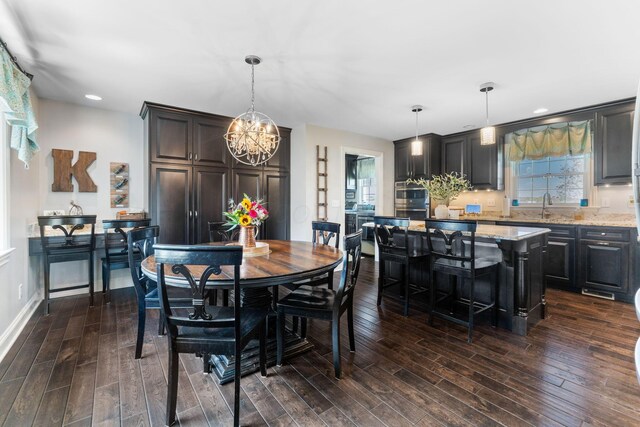 1012 Lake Fork Rd, Utica, OH 43080 - dining room with dark wood-style flooring, an inviting chandelier, a wealth of natural light, and recessed lighting