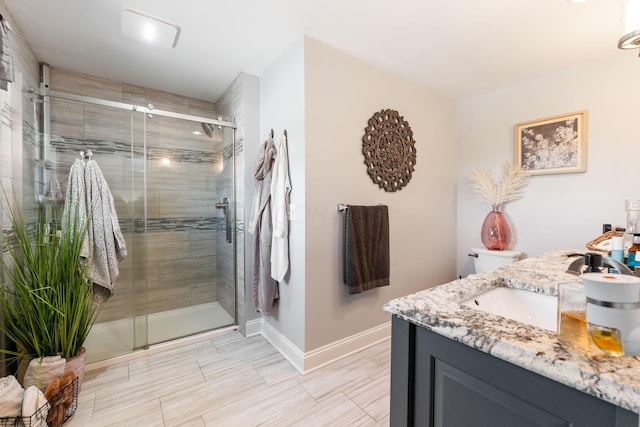 1012 Lake Fork Rd, Utica, OH 43080 - bathroom with baseboards, a shower stall, and vanity
