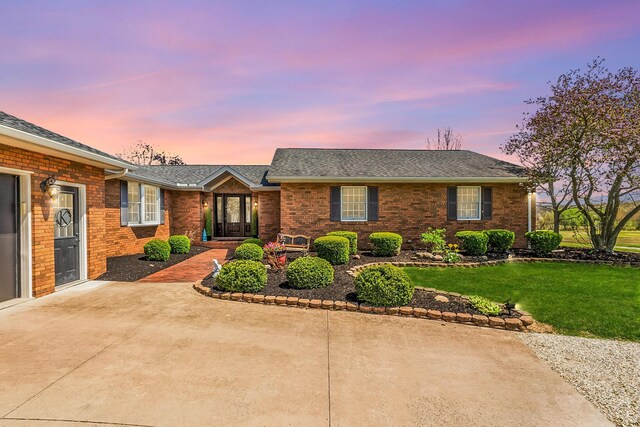 1012 Lake Fork Rd, Utica, OH 43080 - ranch-style home featuring brick siding, a shingled roof, and a front yard