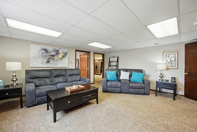 1012 Lake Fork Rd, Utica, OH 43080 - carpeted living room featuring baseboards and a paneled ceiling